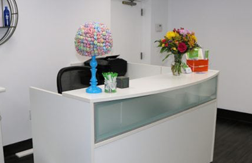 The inside receptionist area of the Rockville lice clinic.